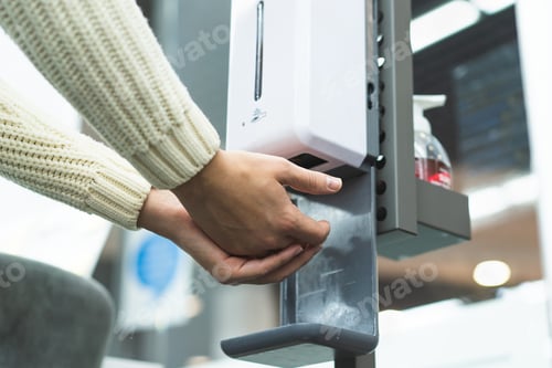 Preview: Cleaning, washing hands using automatic sanitizer dispenser concept.