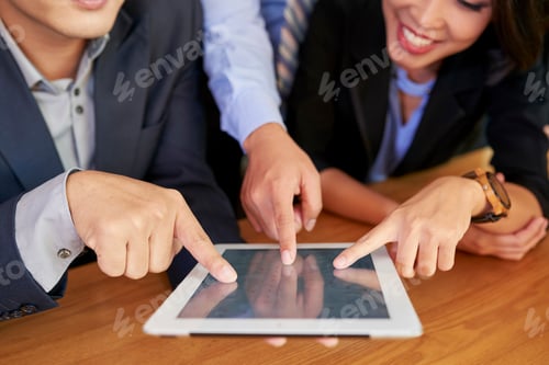 Preview: Business People Using Digital Tablet