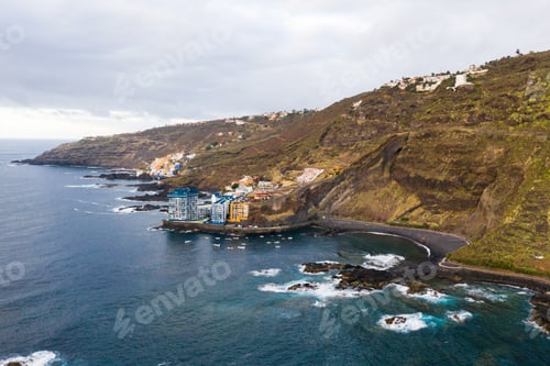 Preview: Rough rocky cliffs in the North of Tenerife.Black beach in the Canary Islands. Rocks, volcanic rocks
