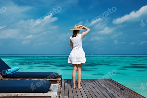 Preview: Woman On A Tropical Beach Jetty At Maldives