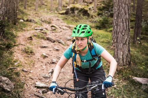 Preview: Woman mountain biking, Bozen, South Tyrol, Italy