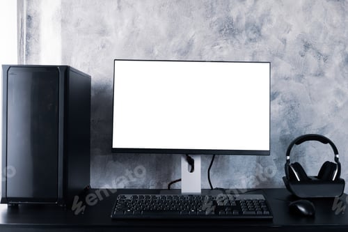 Preview: Black computer with white screen monitor on the desk.