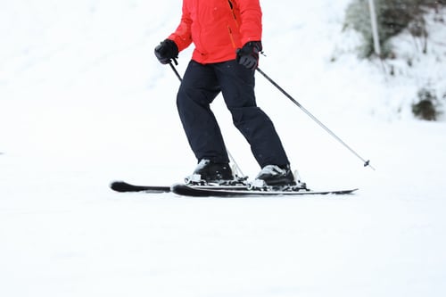 Preview: Skier on slope at resort, closeup. Winter vacation