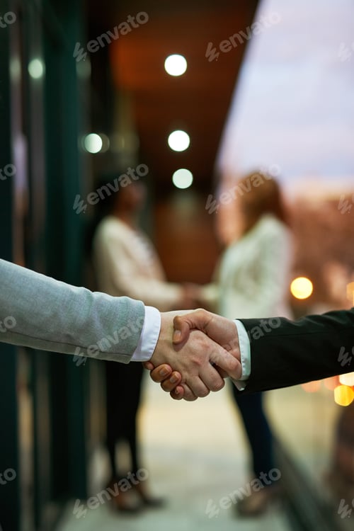 Preview: Building partnerships. Shot of businesspeople shaking hands.