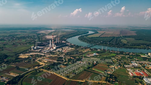 Preview: Areal drone footage of a power plant in a small town