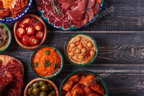 Preview: Typical spanish tapas concept, rustic style, top view.