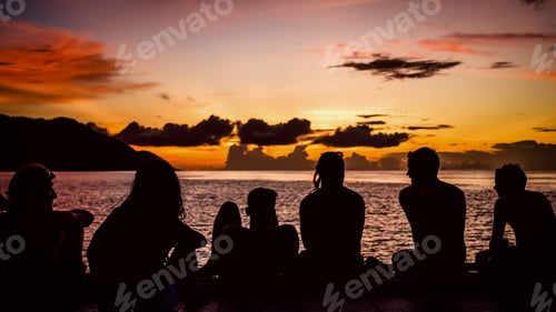 Preview: Travelers, Divers chilling at the Pier on Sunset, Kri Island. Raja Ampat, Indonesia, West Papua