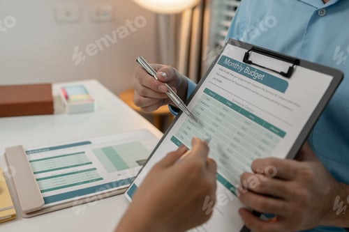 Preview: the company's auditing staff is checking the documents for accuracy in the office