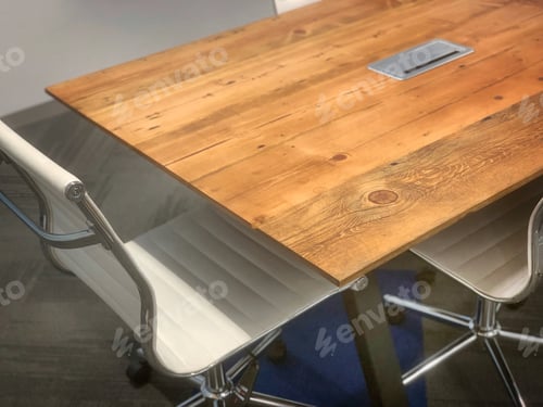 Preview: Modern office decor white leather chairs and wooden conference table with power grommet