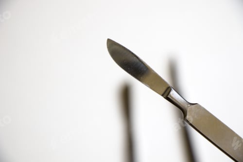 Preview: Surgery blade on sterile white background