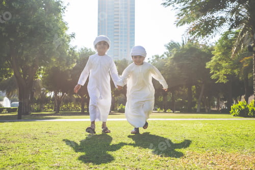 Preview: children playing together in Dubai in the park.