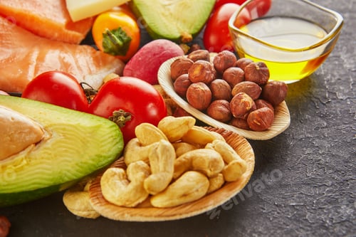 Preview: Ketogenic diet concept. Low carb keto diet food set. Green vegetables, nuts, fish fillets