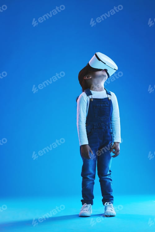 Preview: Glasses, virtual reality and metaverse with girl, future and digital transformation on a blue studi
