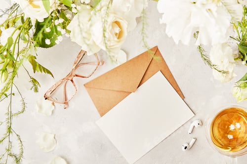 Preview: Feminine flat lay with crafting pastel paper envelope for greetings, invitation
