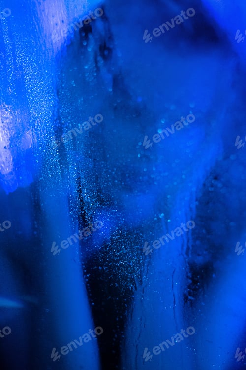 Preview: sexy girl in shower behind wet glass.Looking through Steamed Shower Glass at a Beautiful Sexy Woman