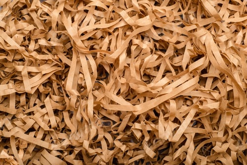 Preview: Shredded craft paper in the foreground. Texture.