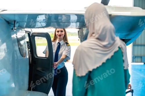 Preview: Female pilot opening aircraft door for muslim passenger