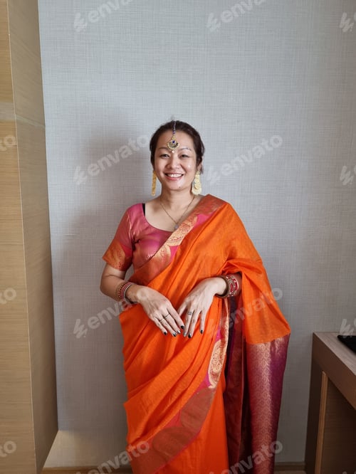 Preview: An Asian woman wearing sari, an Indian woman attire