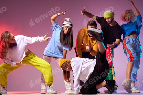 Preview: Active group of dancers in dance hall