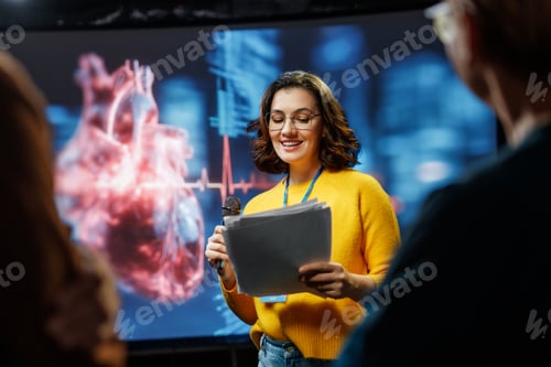Preview: woman is giving a presentation at conference