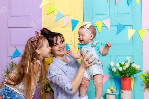 Preview: Happy family celebrating birthday at party. Happy birthday