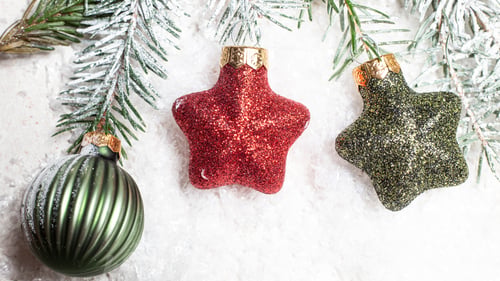 Preview: red and green decorations for christmas tree on white background