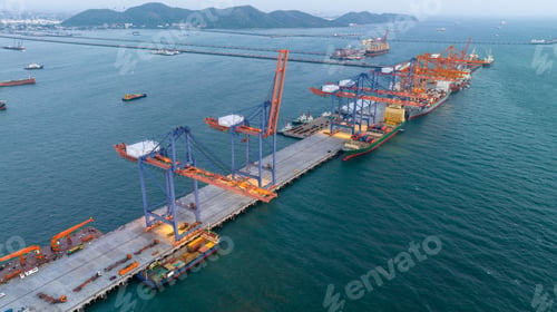 Preview: Crane loading box container to cargo ship at commercial dock port. Shipyard Cargo Container Sea