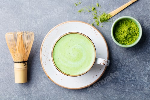 Preview: Matcha Green Tea Latte in a Cup with Bamboo Whisk. Top view.