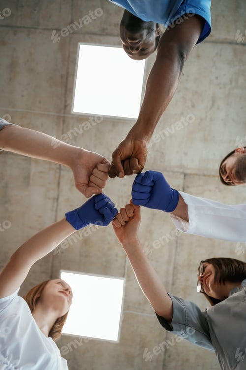 Preview: View from below of group of doctors