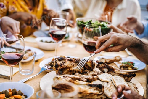Preview: Happy family having bbq dinner party in restaurant rooftop