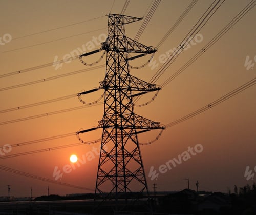 Preview: High voltage Electrical power tower at sunrise.