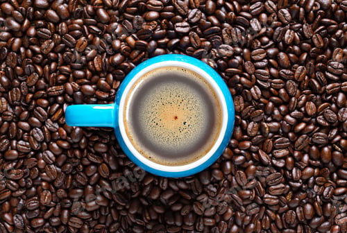 Preview: Fresh coffee in a cup and coffee beans
