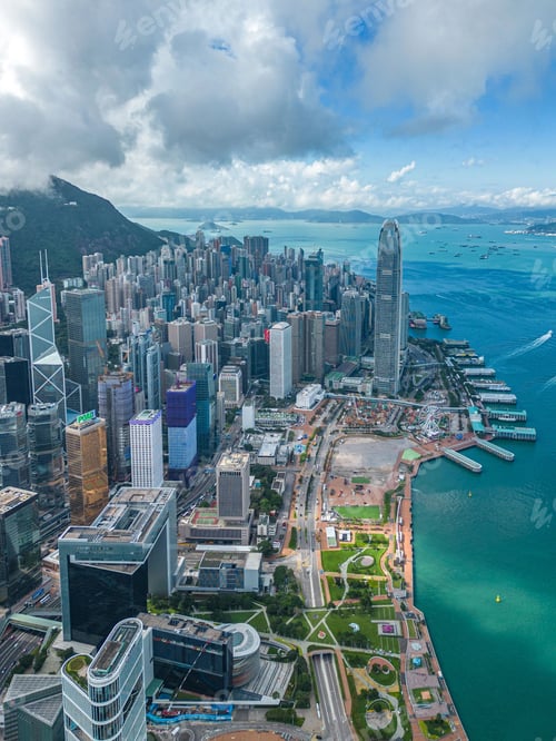 Preview: Vertical aerial view of the bustling city of Hong Kong near the water