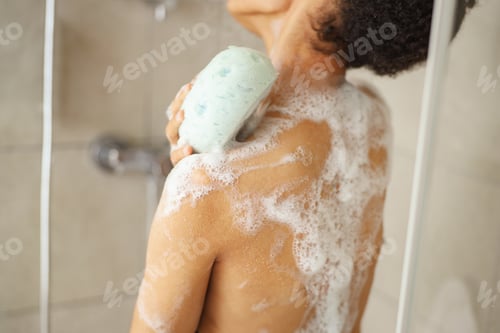 Preview: A young woman is happily bathing in a bathtub