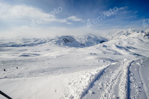 Preview: Alpine winter mountain landscape. French Alps with snow.