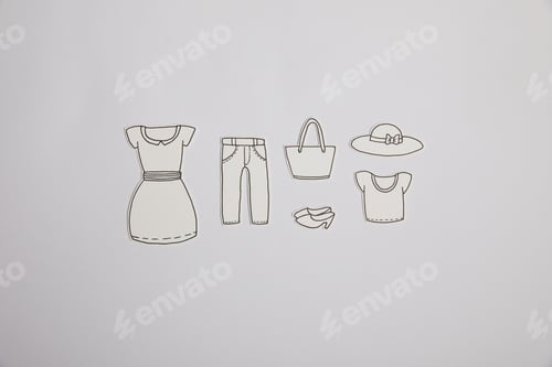 Preview: top view of arranged paper clothes isolated on grey, shopping concept