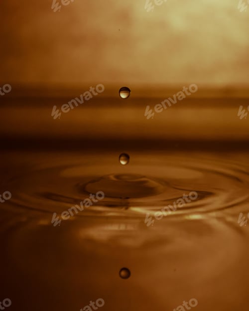 Preview: Water dripping and splashing with a yellow effect