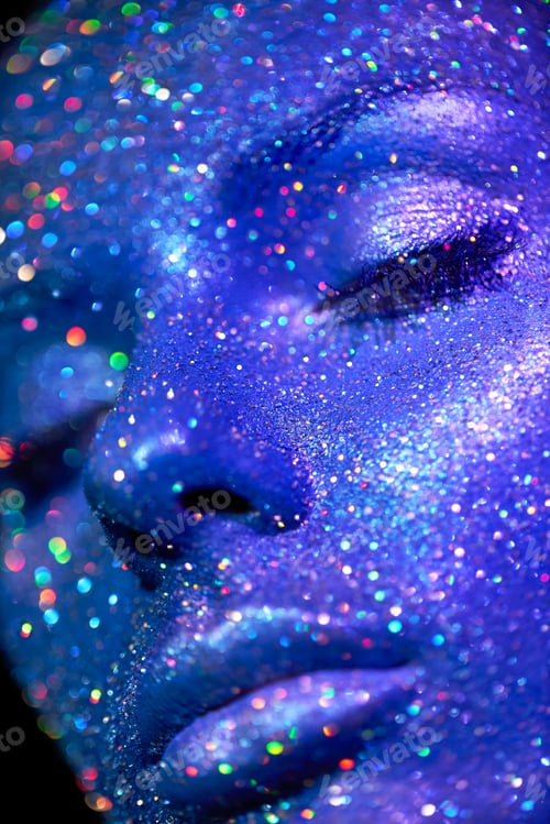 Preview: Portrait of beautiful woman with sparkles on her face