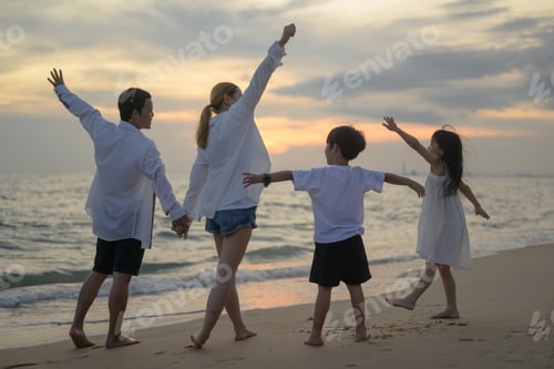Preview: Happy Asian family travel on beach on holiday