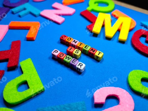 Preview: Selective focus.Colorful dice with word CONTENT IS POWER