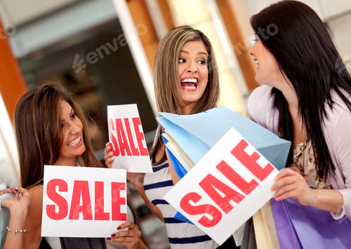 Preview: Excited Group Of Women With Bags Shopping On Sale
