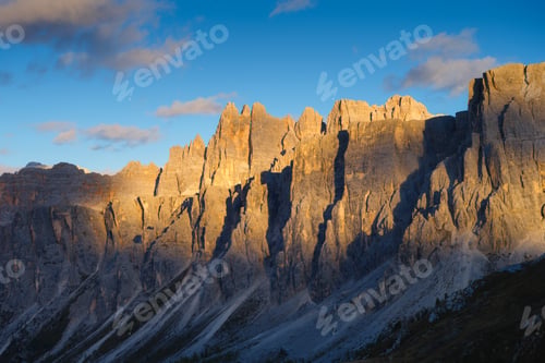 Preview: Dolomite Alps, Italy. View of the mountains and high cliffs during sunset.