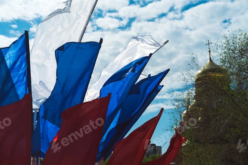 Preview: Flag of Russia against the background of the sky and the Orthodox Church.