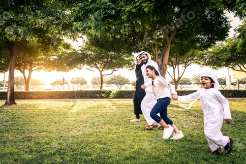 Preview: Happy arabian family in a park