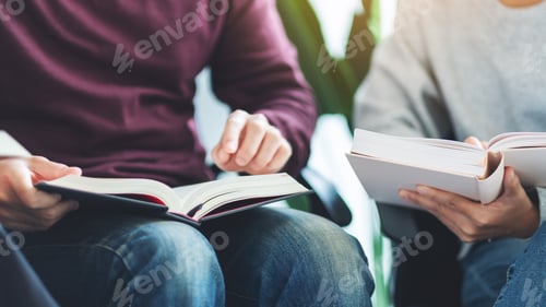 Preview: Group of young people sitting and enjoyed reading books together