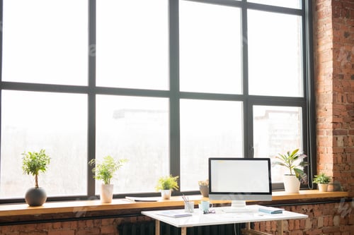 Preview: Workplace by office window