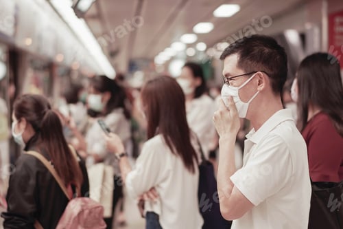 Preview: Asian man wearing face mask on with crowd, air pollution and health concept