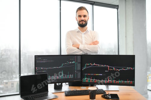 Preview: Financial Analysts and Day Traders Working on a Computers with Multi-Monitor Workstations