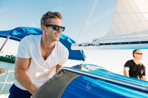Preview: Friends enjoying view on sailboat