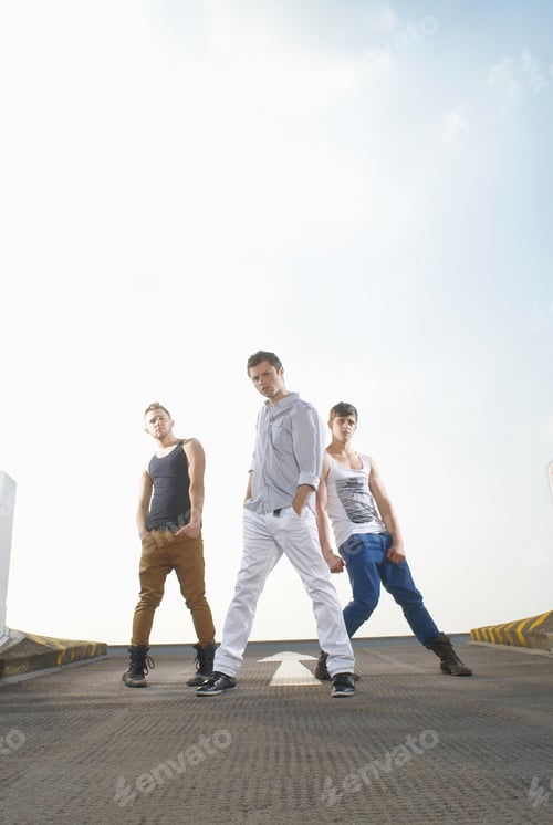 Preview: Men dancing in road